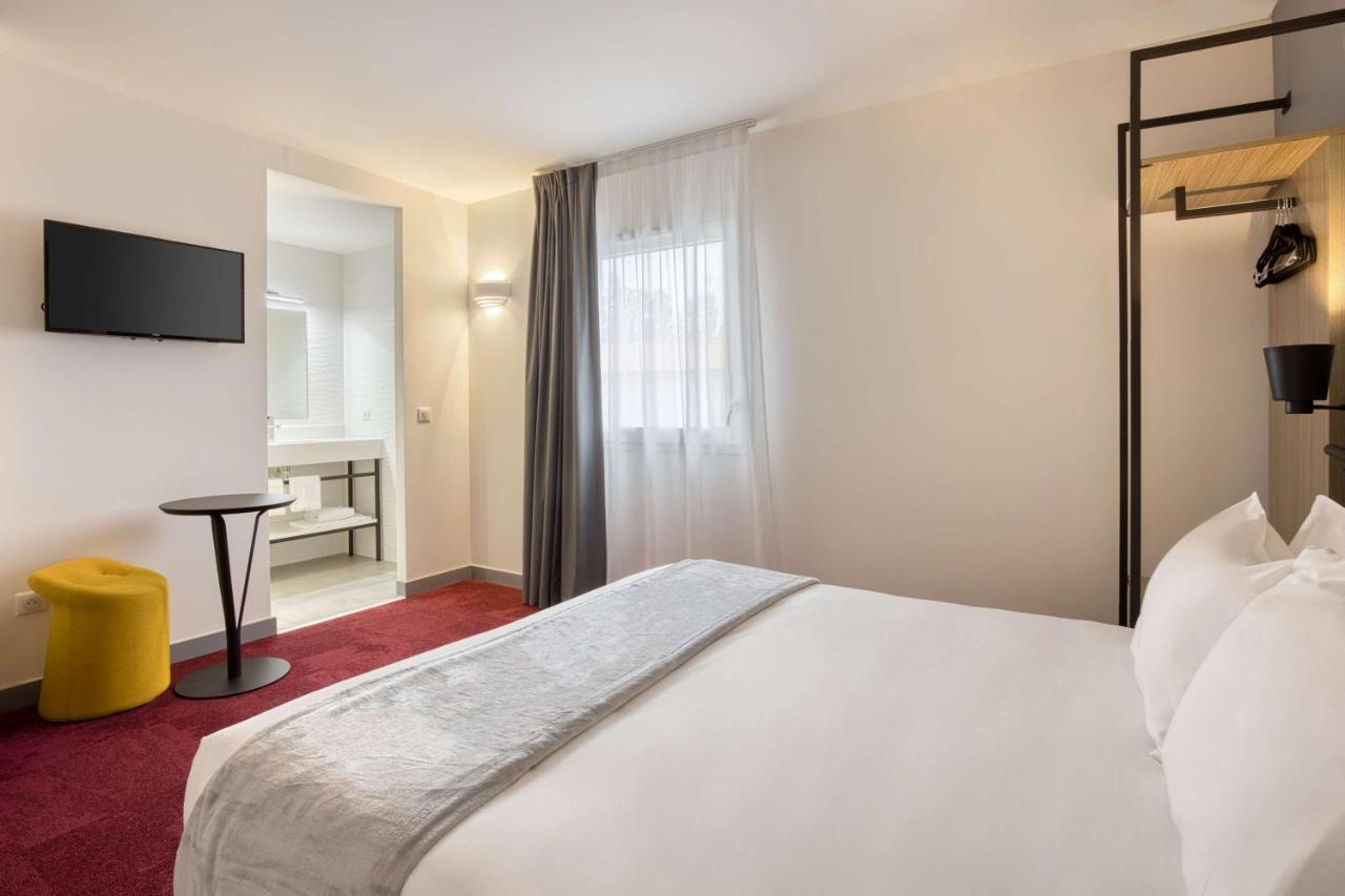 Sure Hotel By Best Western Les Portes De Montauban Bagian luar foto