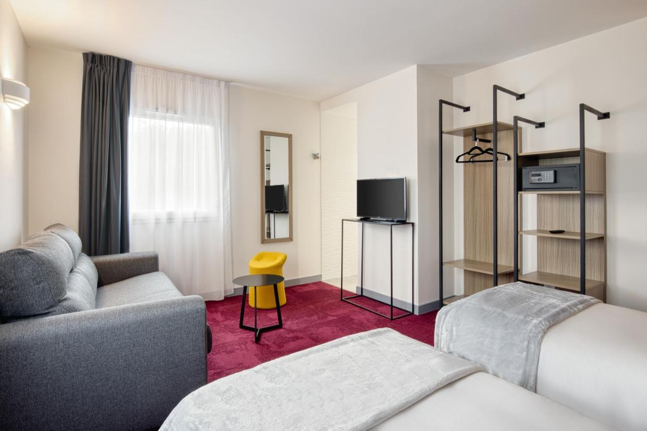 Sure Hotel By Best Western Les Portes De Montauban Bagian luar foto